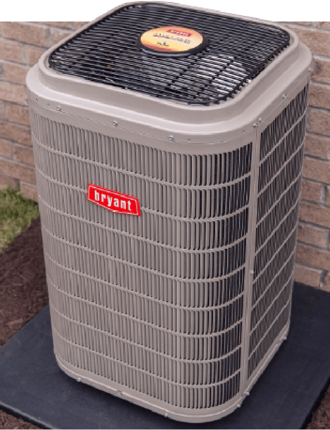 Bryant air conditioner on concrete pad outside Champaign, IL, home.